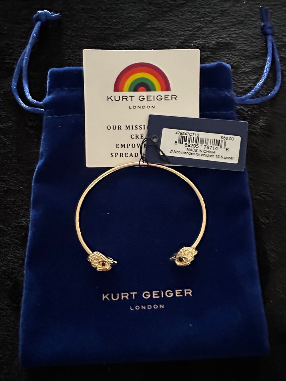Kurt Geiger Gold Open-Ended Bangle with Eagle Head